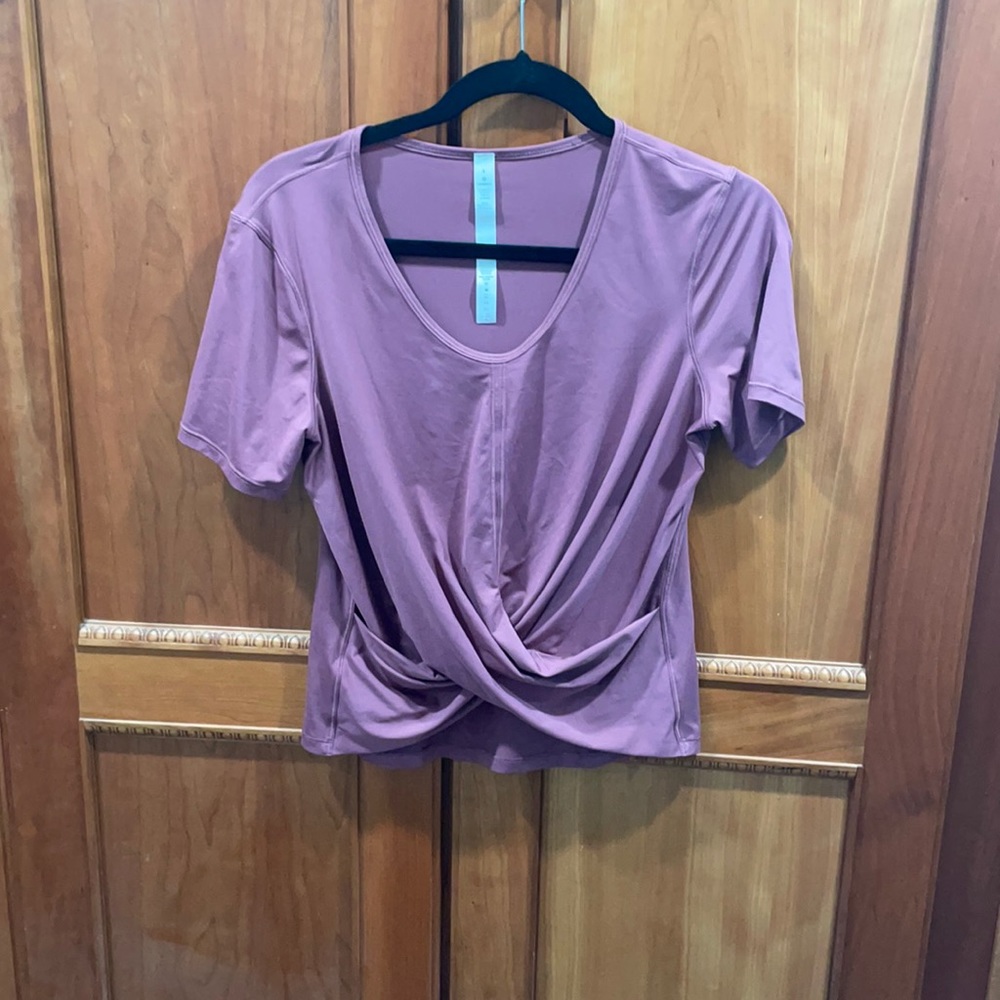 Color is more of the mauve color, lighting of photo makes it look purple.